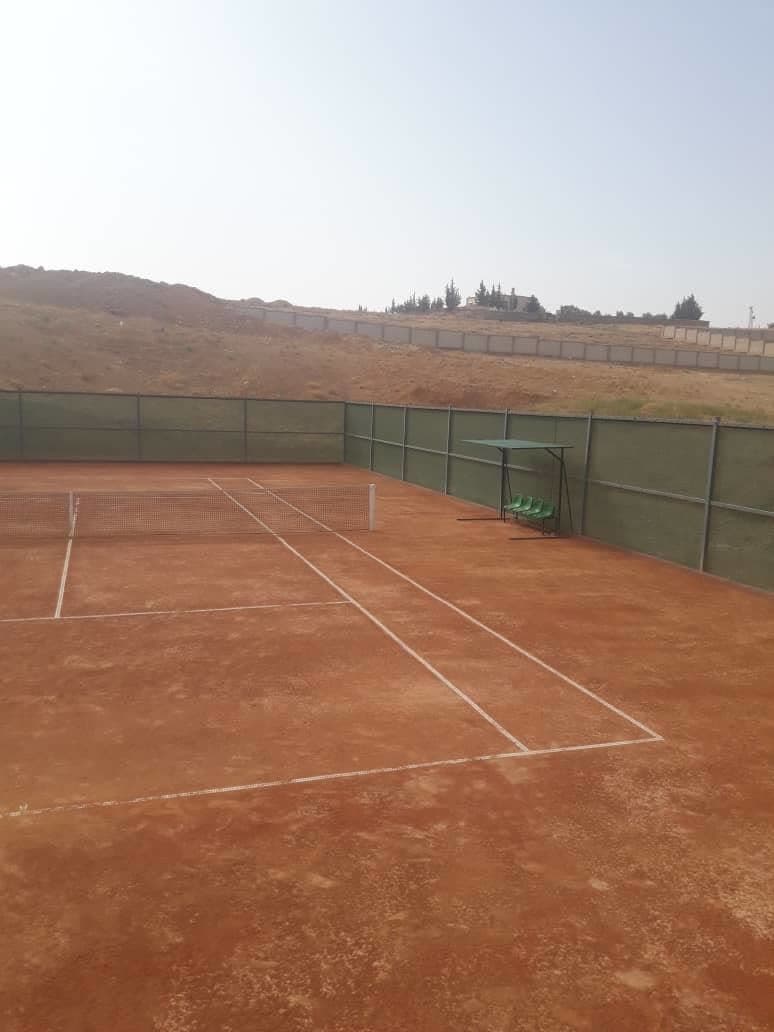 A clay tennis court built by Sarakbi Group